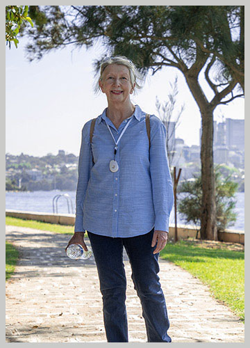 Senior lady outdoors wearing a Live Life alarm pendant